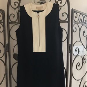 Ladies black shift, knee cap length dress